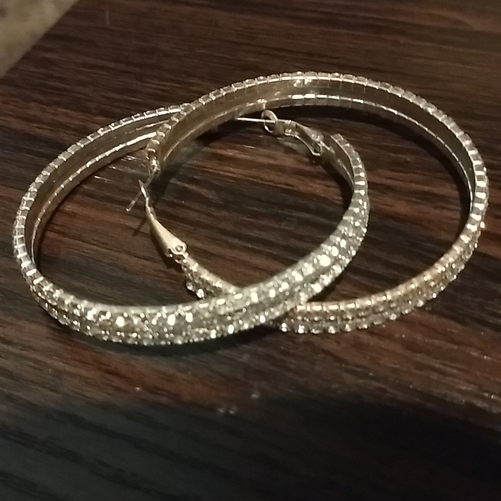 Holiday earrings. Hoops color silver and stones. 2 inches